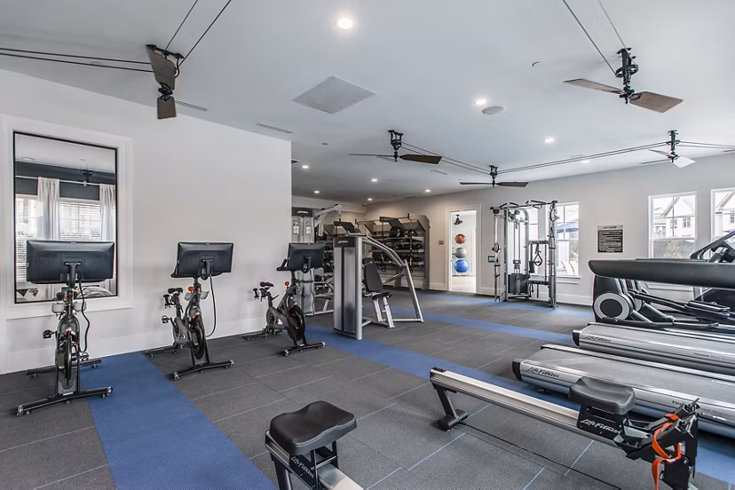 Modern clubhouse with luxury seating and entertainment options at Novel Lockwood Glen Apartments