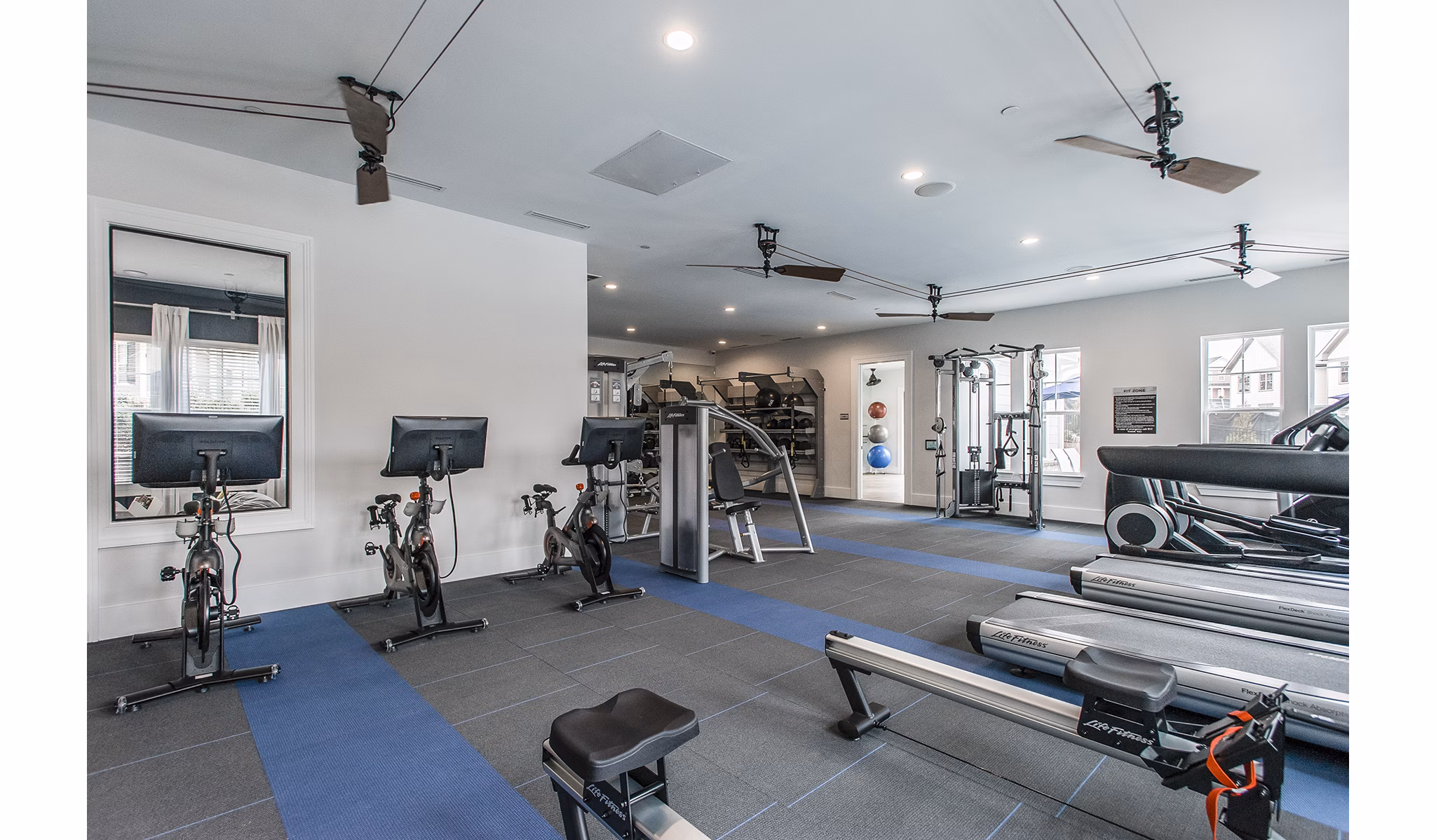 Modern clubhouse with luxury seating and entertainment options at Novel Lockwood Glen Apartments