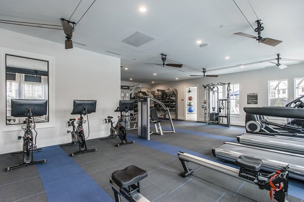 Modern clubhouse with luxury seating and entertainment options at Novel Lockwood Glen Apartments