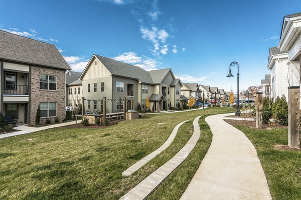 Courtyard with lush landscaping and seating areas at Novel Lockwood Glen luxury apartments in vibrant neighborhood setting