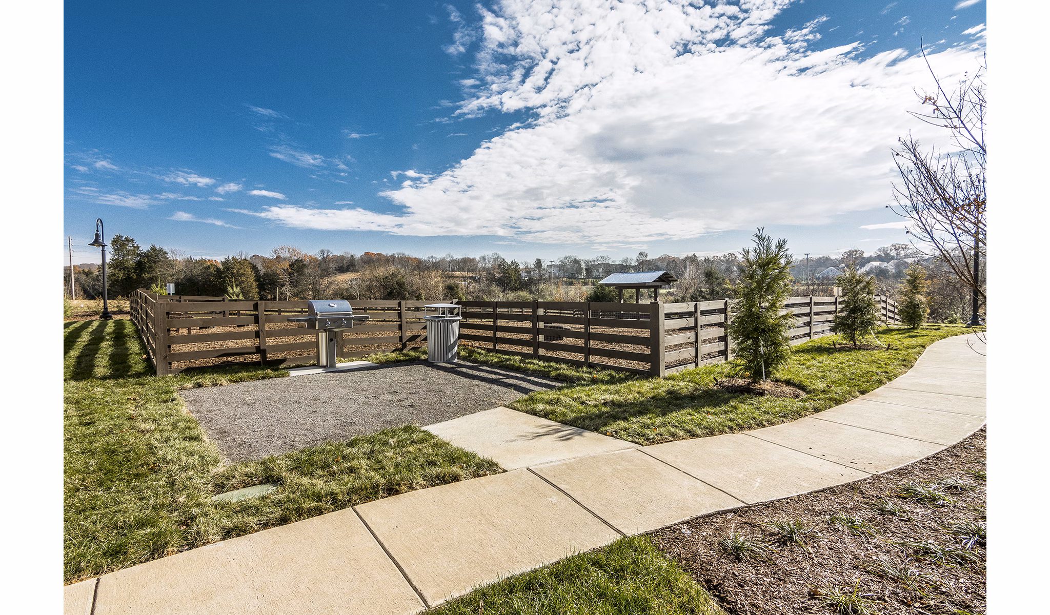 Outdoor grill area for social gatherings at Novel Lockwood Glen Apartments, offering a luxury community experience