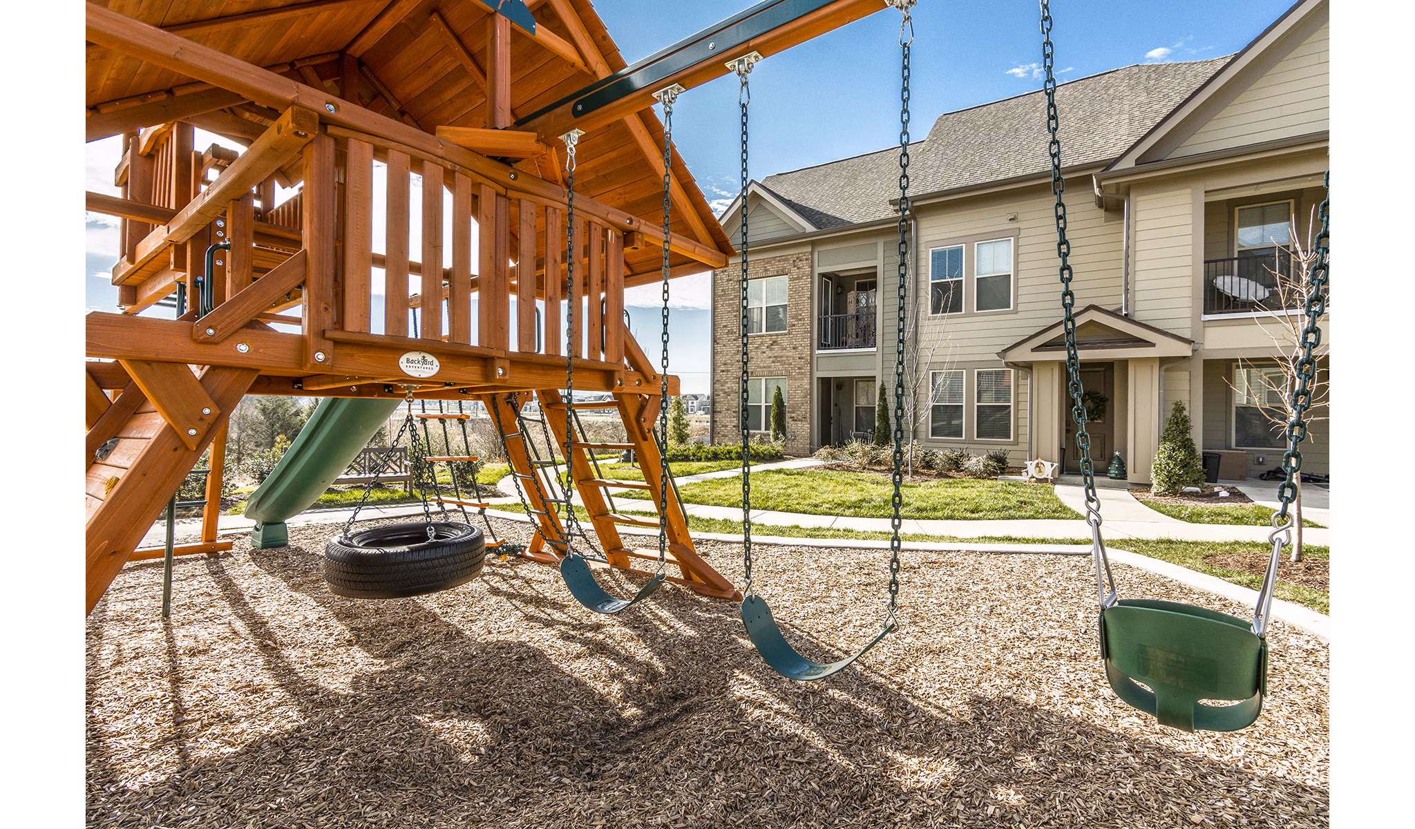 Playground with modern equipment at Novel Lockwood Glen Apartments, luxury living with family-friendly amenities