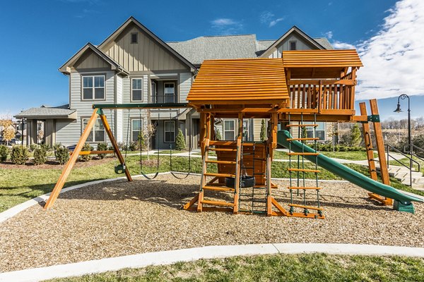 Outdoor playground with modern equipment at Novel Lockwood Glen Apartments, perfect for family-friendly activities