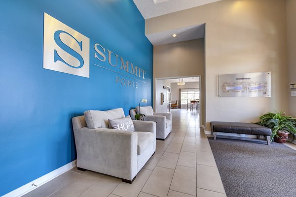 Lobby featuring modern seating and elegant decor at Summit Pointe Apartments