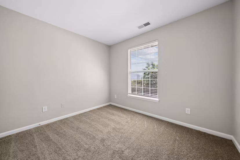 Walk-in closet with ample storage at Summit Pointe Apartments