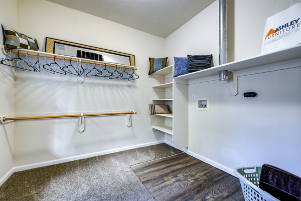 Walk-in closet with ample storage at Summit Pointe Apartments