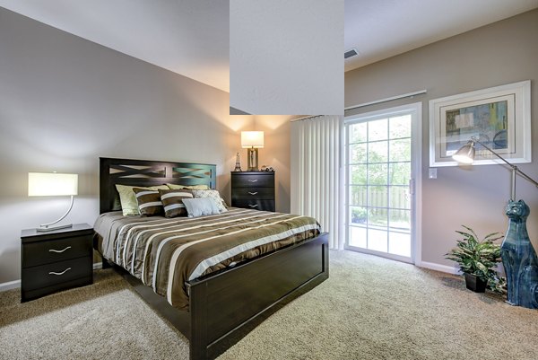 Bedroom featuring modern furnishings and stylish decor at Summit Pointe Apartments luxury community