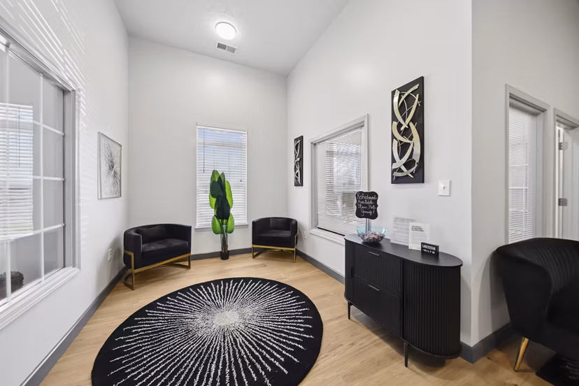Stylish clubhouse with modern furnishings at Summit Pointe Apartments, offering luxury living in a vibrant community
