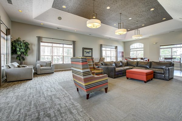 Stylish clubhouse with modern furnishings at Summit Pointe Apartments, offering luxury living in a vibrant community