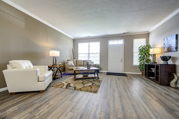 Spacious living room with modern decor at Summit Pointe Apartments
