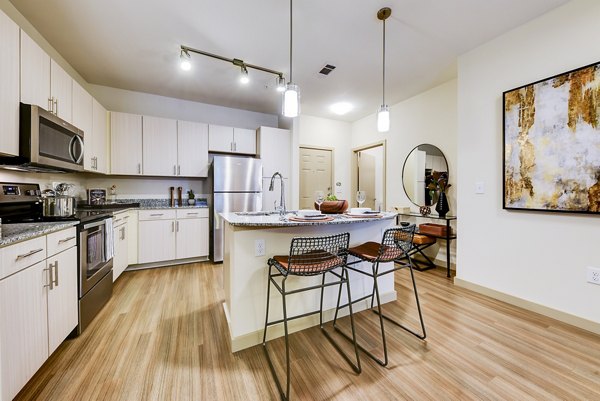 Dining room featuring elegant table setting and modern lighting at Dalian 151 Apartments