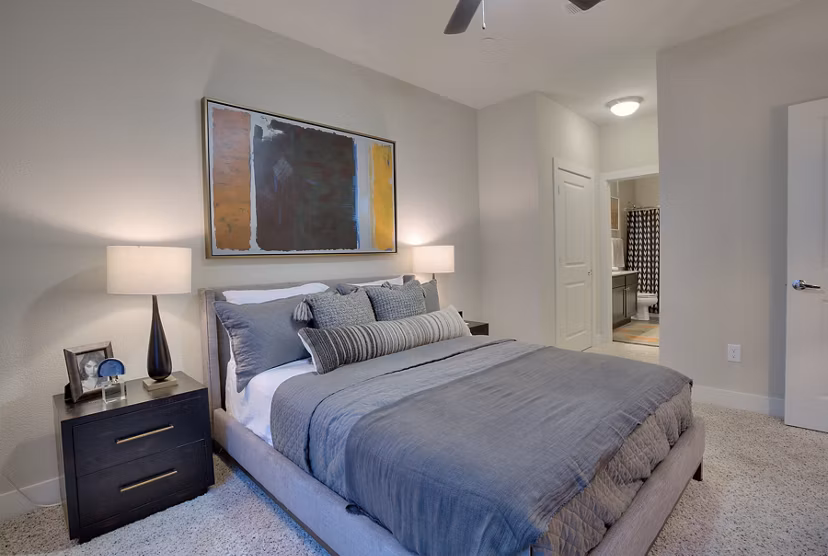 Cozy bedroom with natural light at Lakeview Villas Apartments