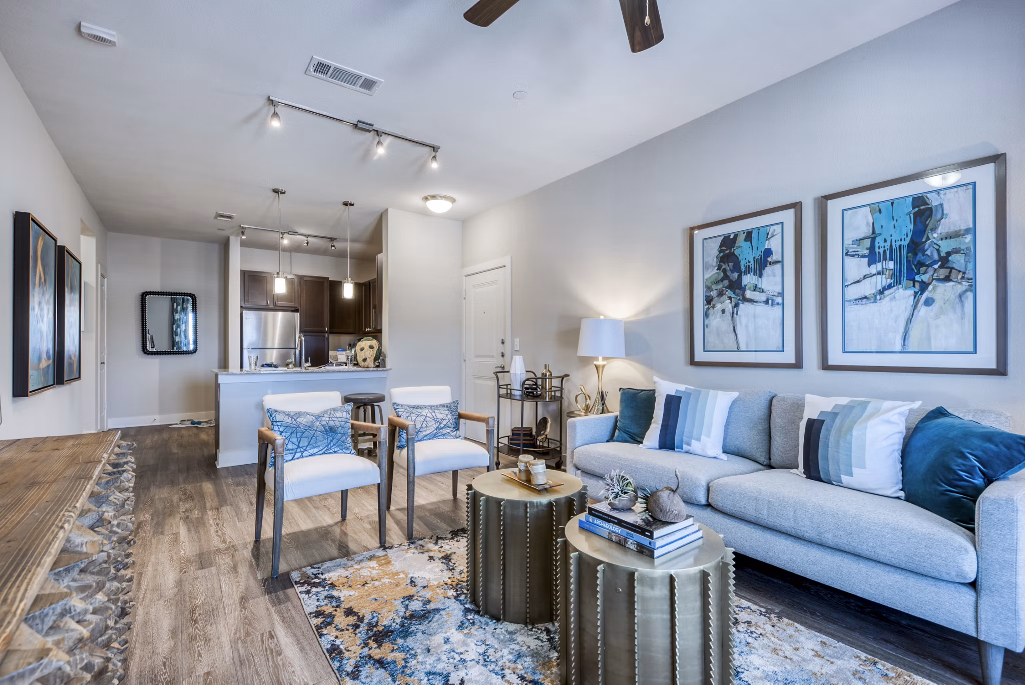 Spacious living room with stylish decor and natural lighting in Lakeview Villas Apartments