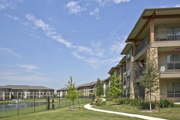 Dog-friendly green space dog park at Lakeview Villas Apartments, perfect for pet owners seeking a luxury lifestyle in a serene setting