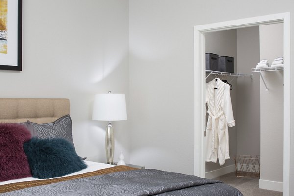 Spacious closet with built-in shelving at The Glenn Apartments, ideal for organized luxury living