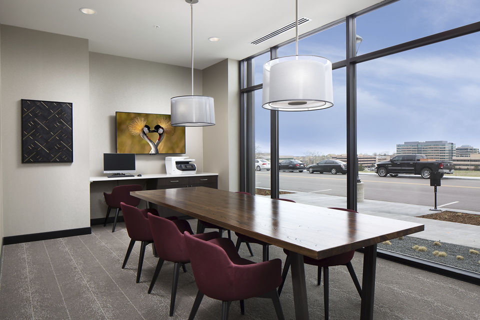 Meeting room with modern amenities at The Glenn Apartments