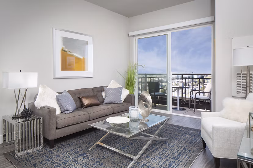 Spacious living room with modern decor at The Glenn Apartments offering luxury living