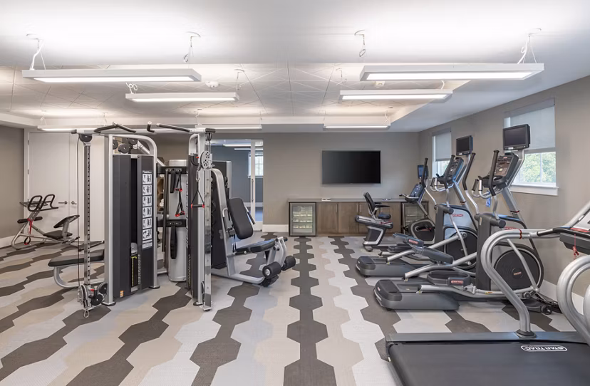 Modern fitness center with state-of-the-art equipment at Overture West Ashley Apartments