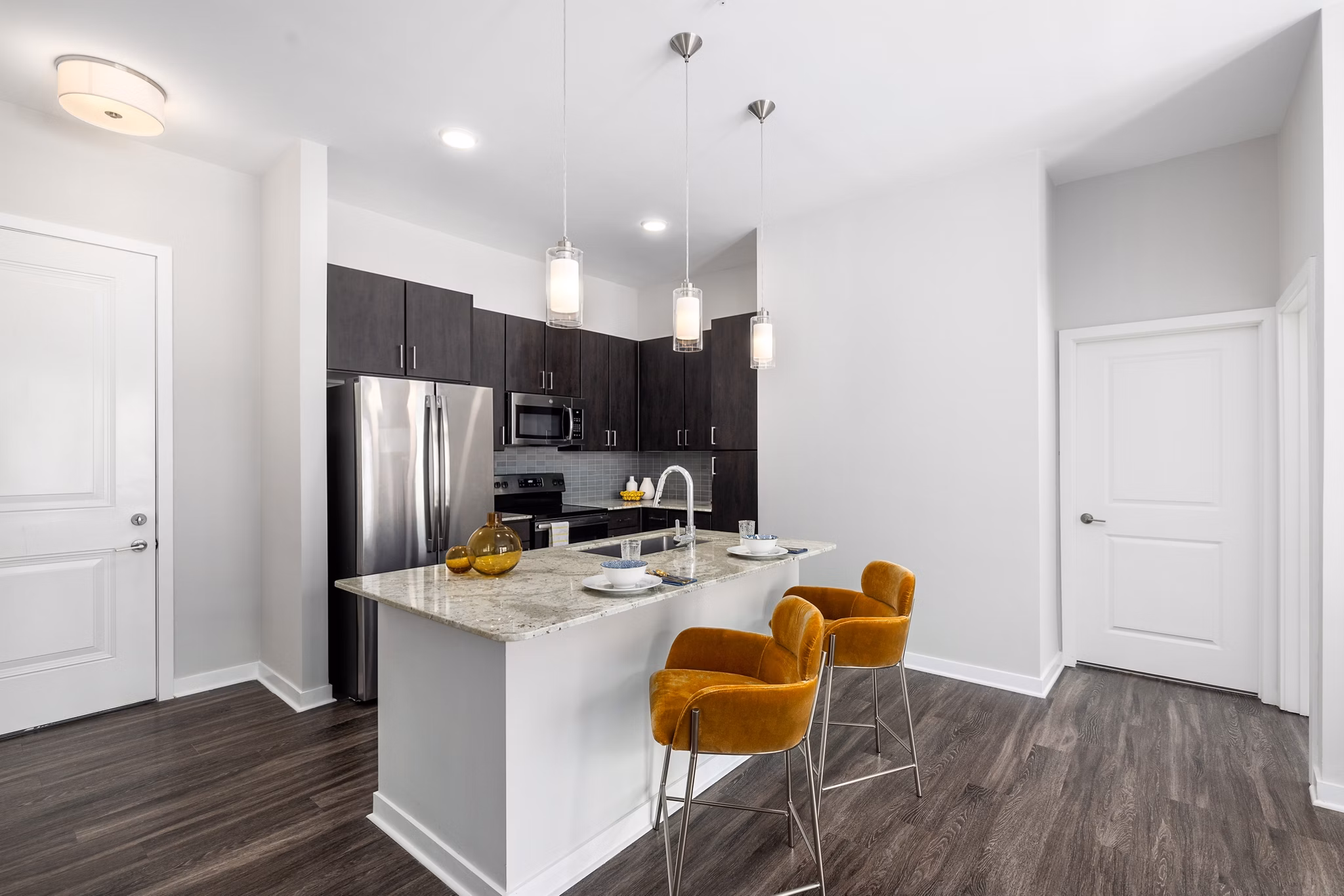 Modern kitchen with stainless steel appliances at Overture West Ashley Apartments