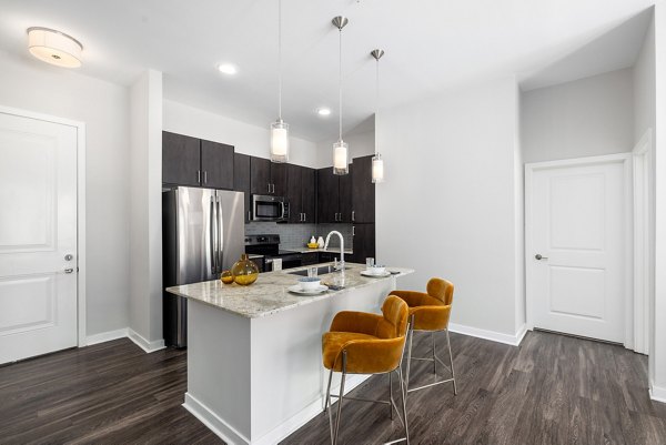 Modern kitchen with stainless steel appliances at Overture West Ashley Apartments