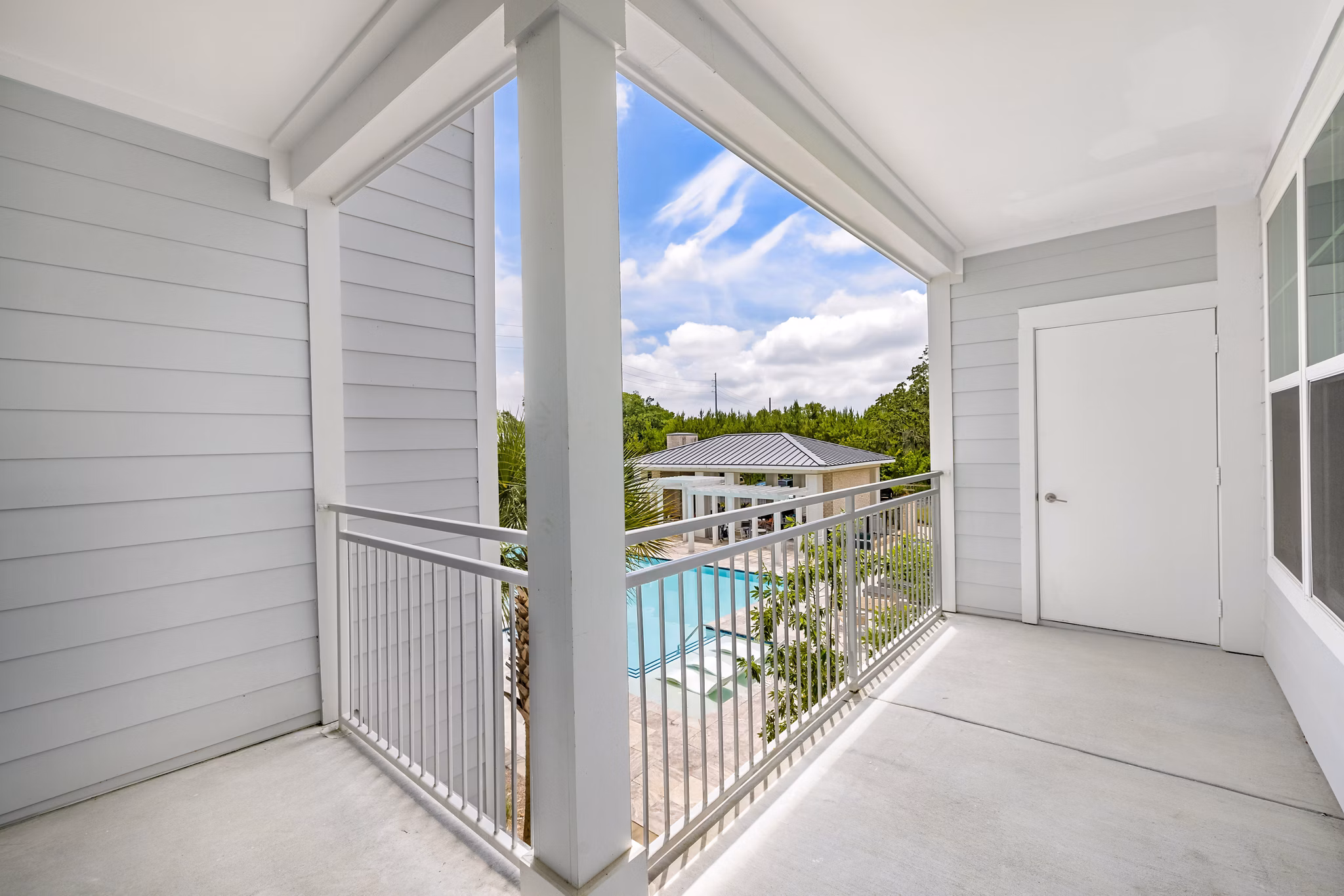 Outdoor patio with elegant seating at Overture West Ashley Apartments
