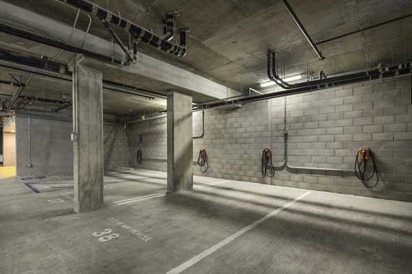 Secure parking garage at AV8 Apartments offering modern amenities in a luxury urban setting
