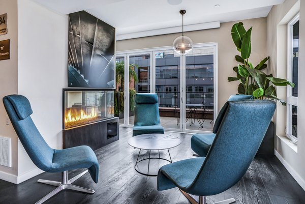 Clubhouse with contemporary design and cozy seating at AV8 Apartments