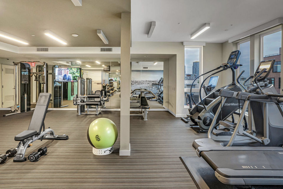 fitness center at AV8 Apartments 