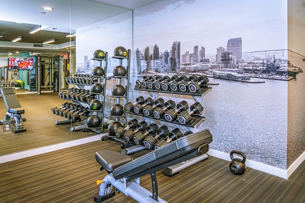 Modern fitness center with state-of-the-art equipment at AV8 Apartments