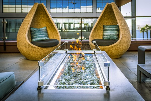 Cozy fire pit at AV8 Apartments perfect for evening gatherings