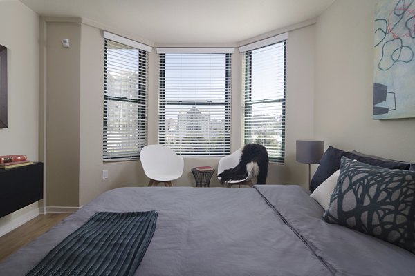 Luxurious bedroom with modern decor at The Fillmore Center apartments