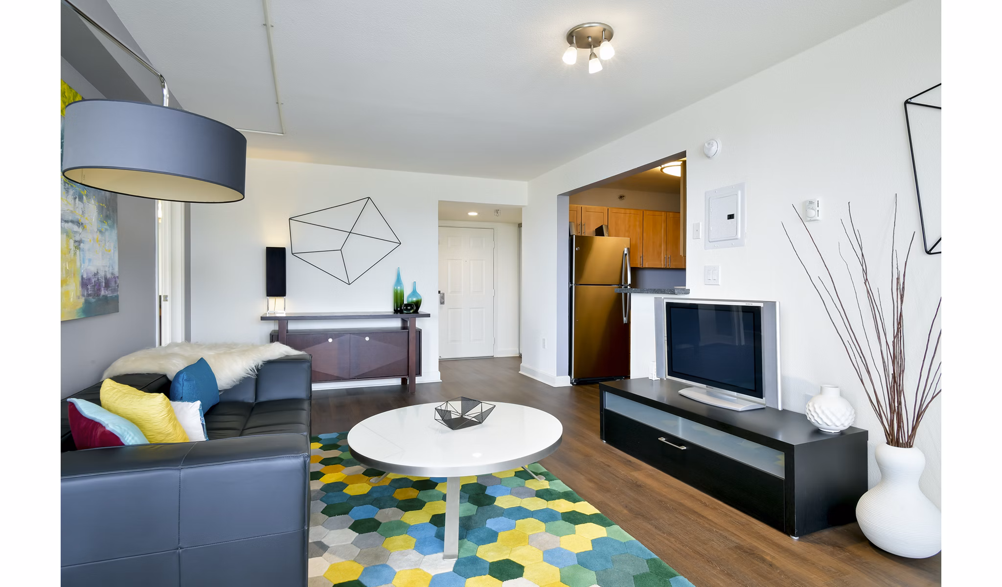 Spacious living room with modern decor at The Fillmore Center Apartments, perfect for luxury living in San Francisco