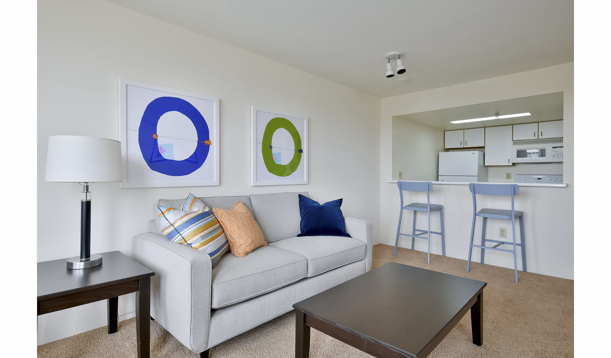 Spacious living room with modern furnishings in The Fillmore Center Apartments at Greystar luxury apartments