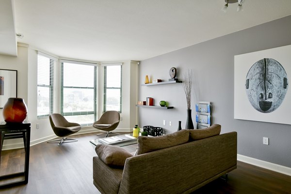 Spacious living room with modern furnishings at The Fillmore Center Apartments, featuring Greystar luxury living in vibrant San Francisco, CA