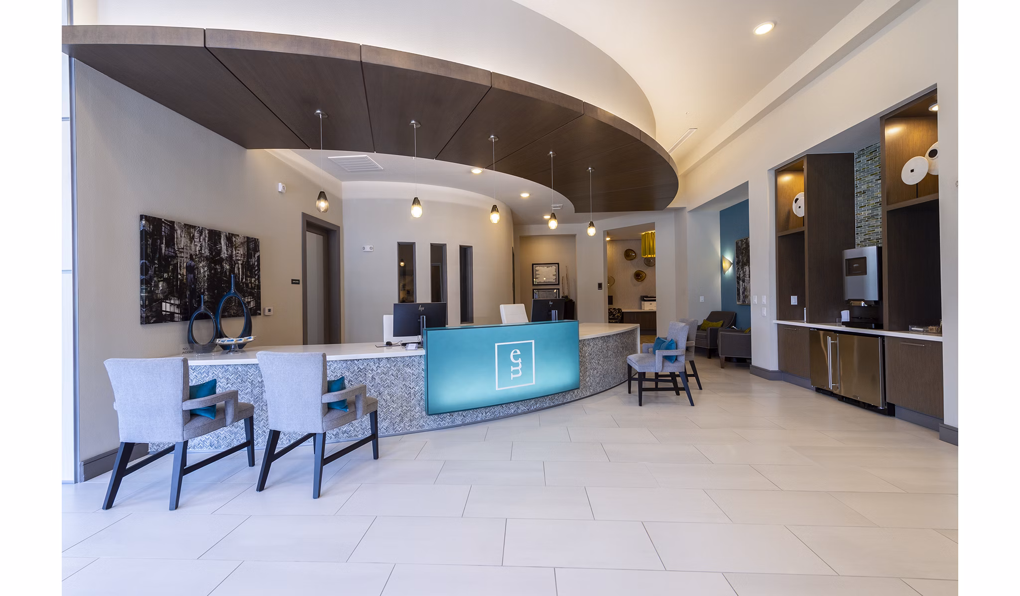 Clubhouse featuring modern dÃ©cor and seating at Encore Montrose Apartments, a luxury property perfect for relaxing and socializing