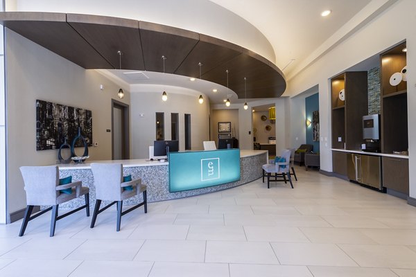 Clubhouse featuring modern dÃ©cor and seating at Encore Montrose Apartments, a luxury property perfect for relaxing and socializing