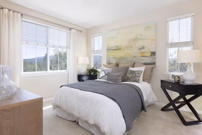 Bedroom featuring modern design and plush bedding in Aventino Apartments, a luxurious living space in a prime location