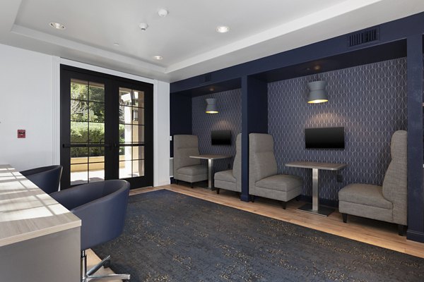 Clubhouse featuring modern design and cozy seating at Aventino Apartments luxury community