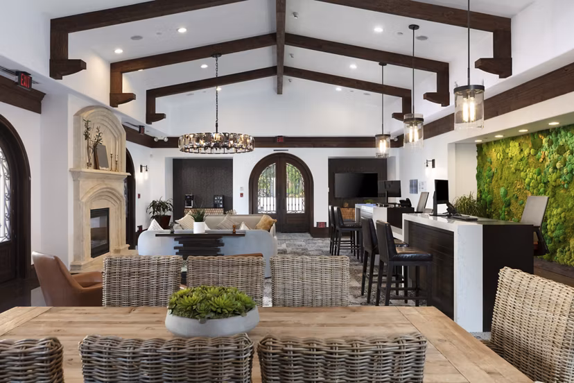 Clubhouse with modern furnishings and open spaces at Aventino Apartments