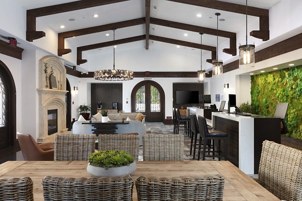 Clubhouse with modern furnishings and open spaces at Aventino Apartments