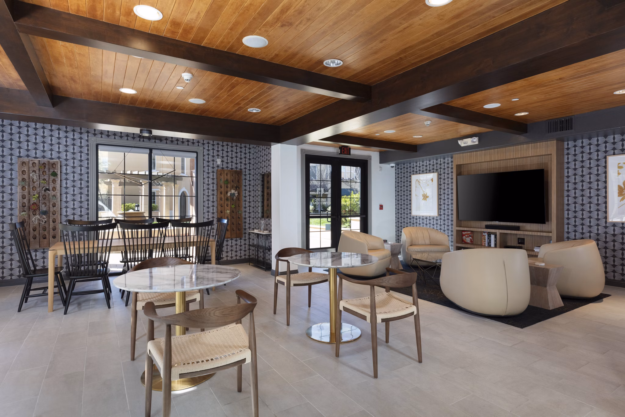 Modern clubhouse with stylish decor at Aventino Apartments in luxury setting