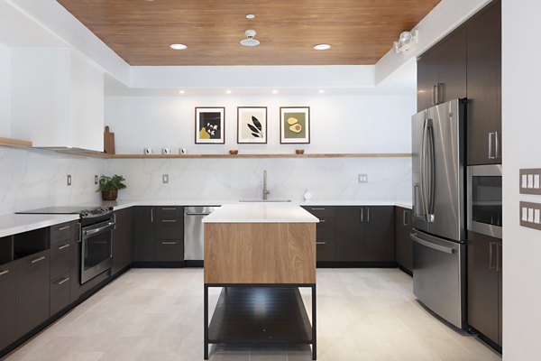 Aventino Apartments: Stylish clubhouse with modern decor, perfect for social gatherings in a luxury community setting