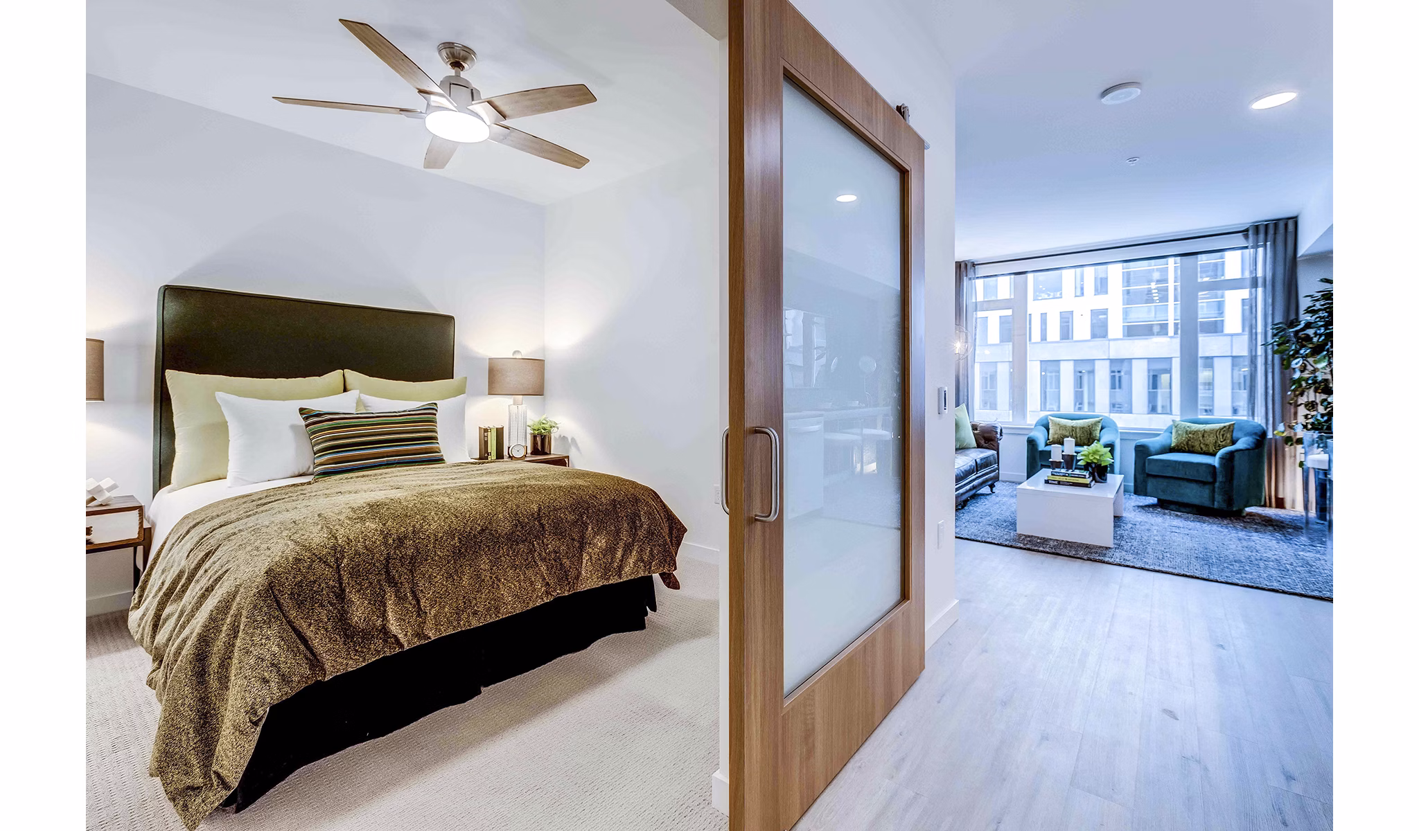 Cozy bedroom with modern furnishings at Marlowe Apartments