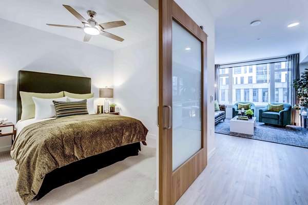 Cozy bedroom with modern furnishings at Marlowe Apartments
