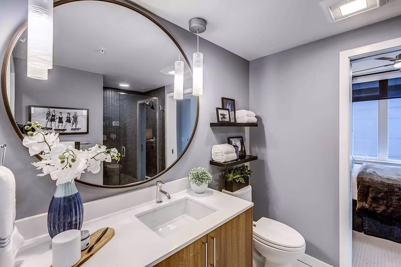 Bathroom featuring modern fixtures and elegant tilework at Marlowe Apartments