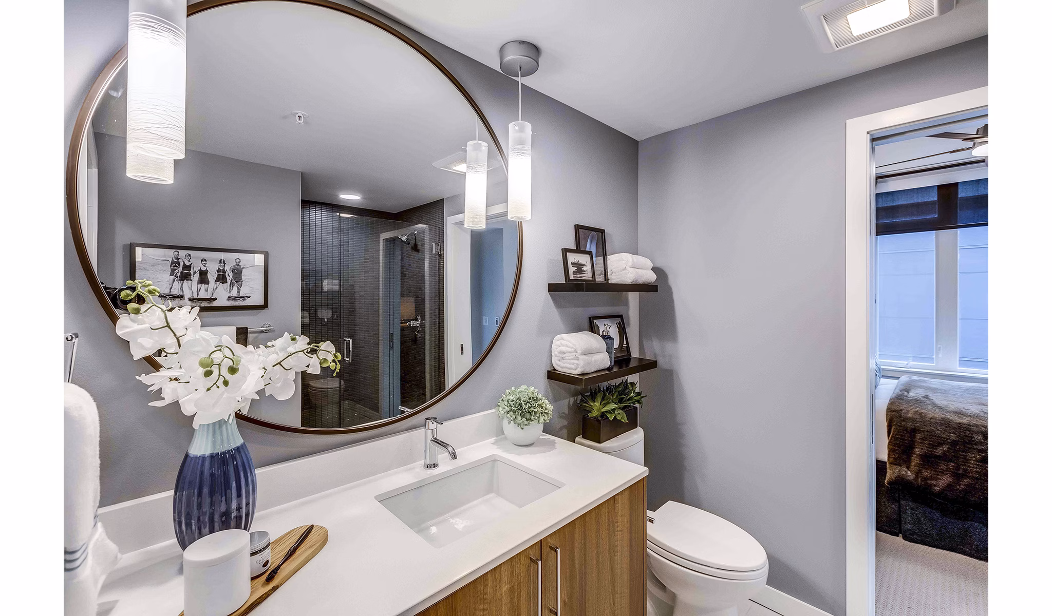 Bathroom featuring modern fixtures and elegant tilework at Marlowe Apartments