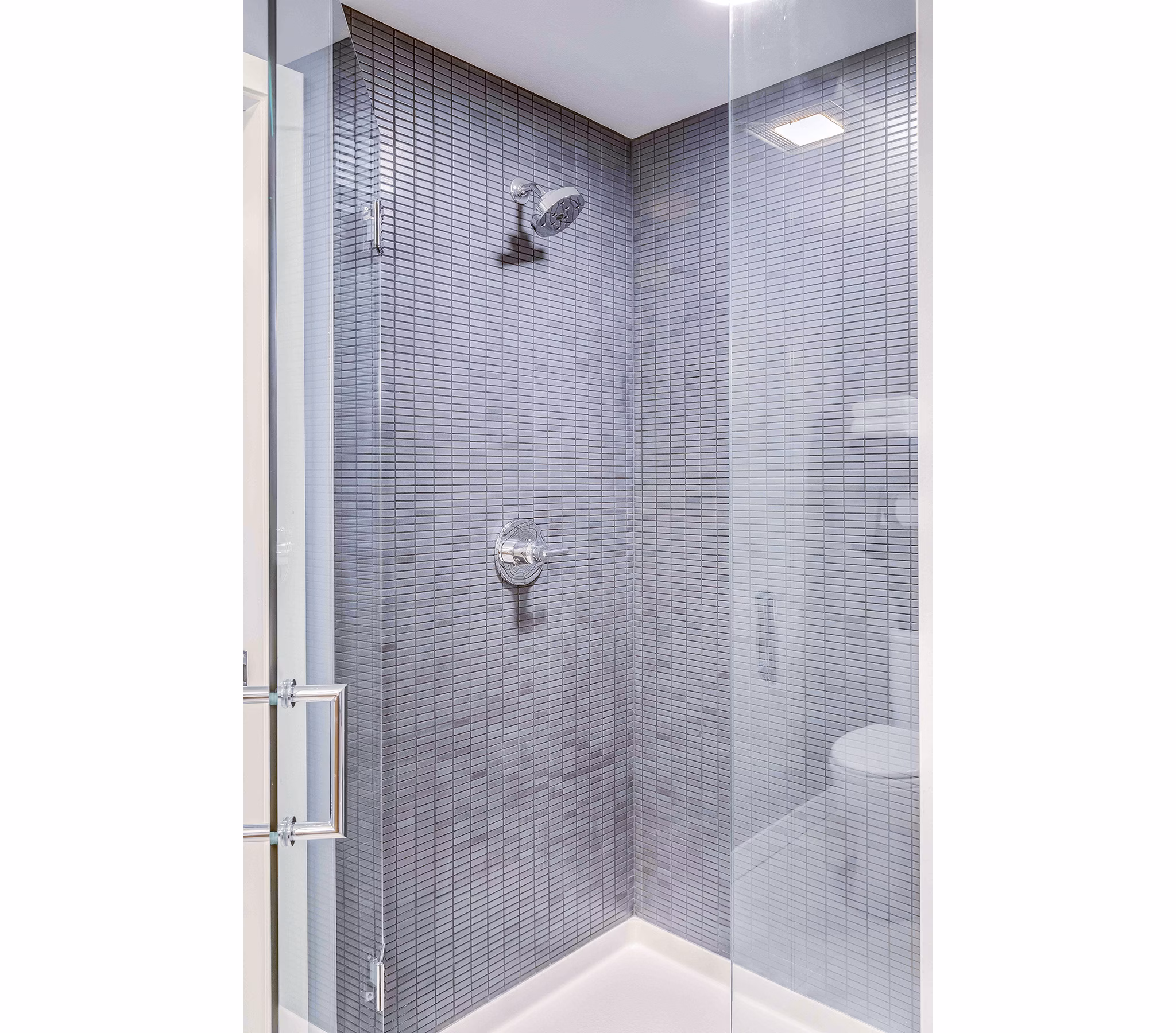 Bathroom featuring modern fixtures and stylish marble countertops in Marlowe Apartments