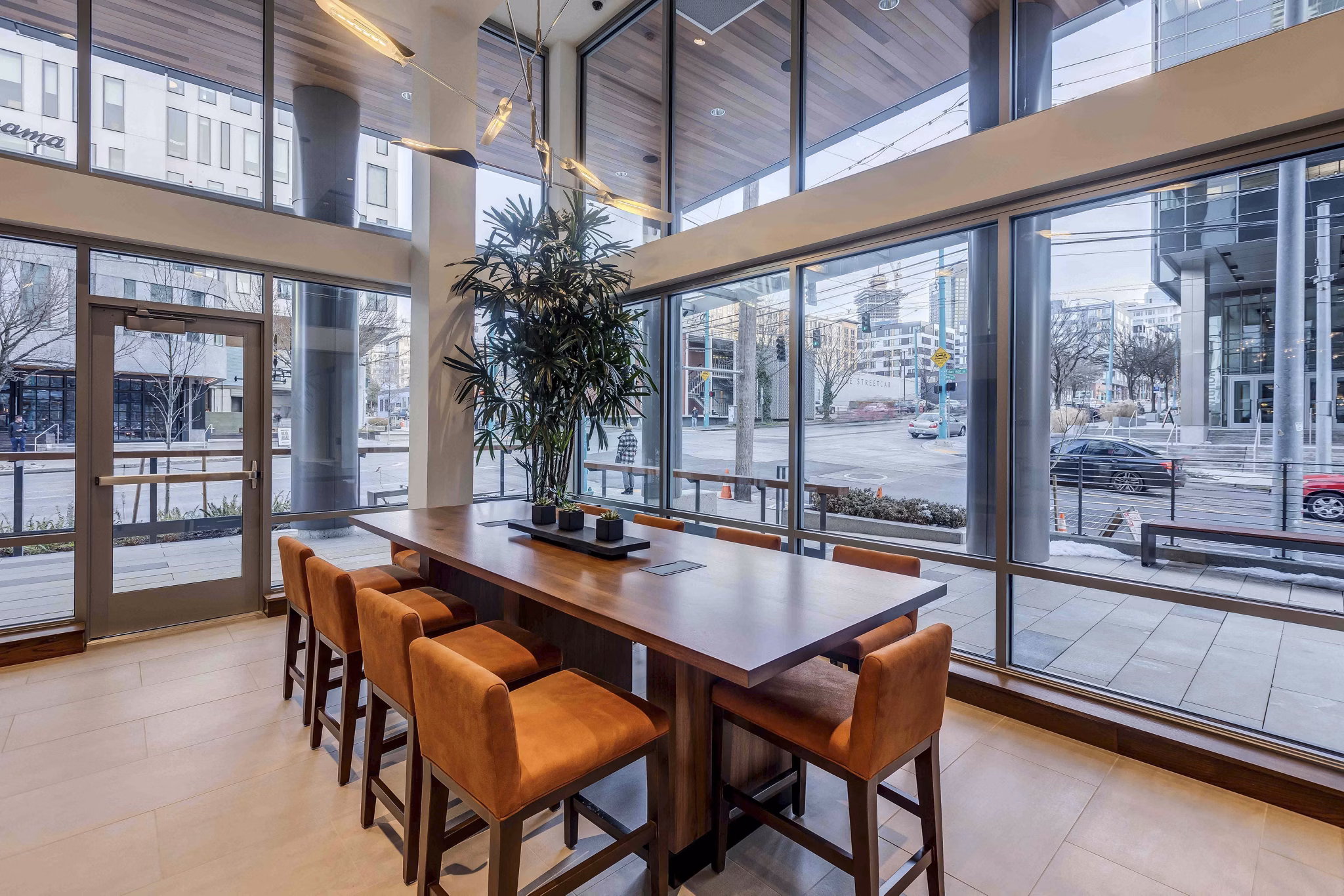 Meeting facility with modern seating and conference technology at Marlowe Apartments, ideal for business gatherings and community events