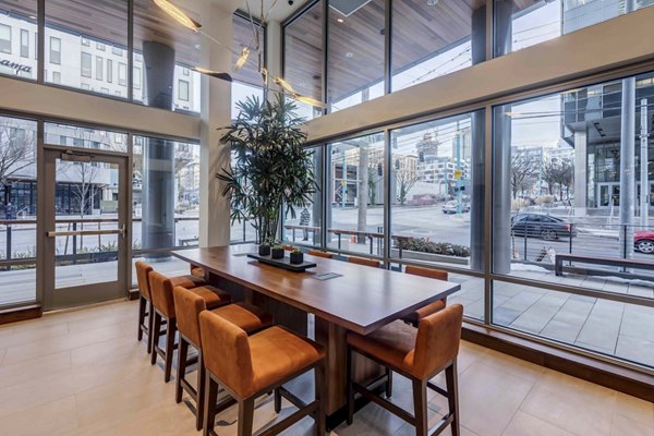 Meeting facility with modern seating and conference technology at Marlowe Apartments, ideal for business gatherings and community events