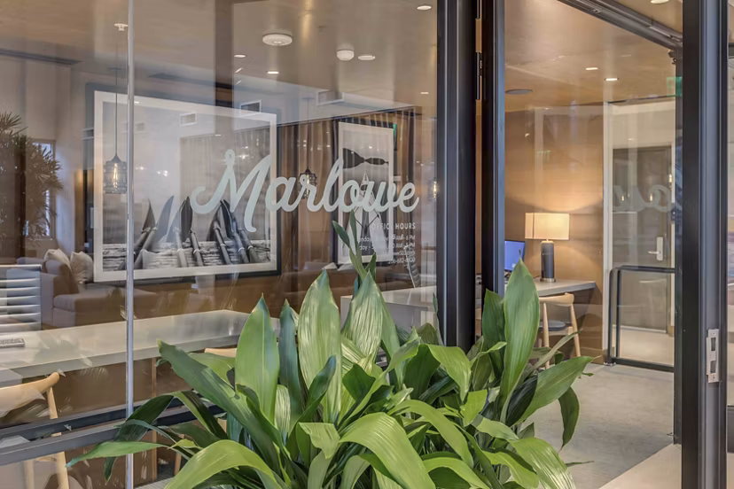 Marlowe Apartments: Modern signage marking luxury apartment complex entry